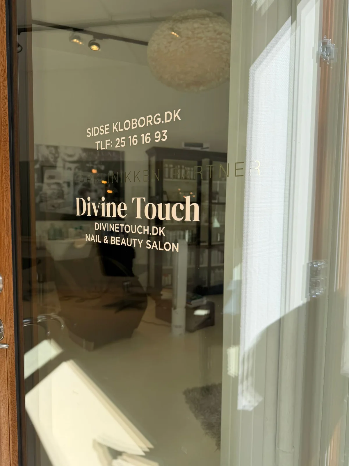 Door with Divine Touch and Sidse Kloborg signage